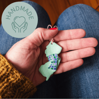 Polymer Clay Ornament of New Jersey Wearing a Scarf