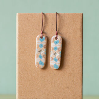 Dangly Earrings<br><small>Ear Wires: Copper, Shape: Capsule (1 1/4"), Design: Cloudy Jubilee</small>