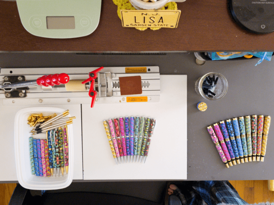 My work table with finished pens and pencils in progress